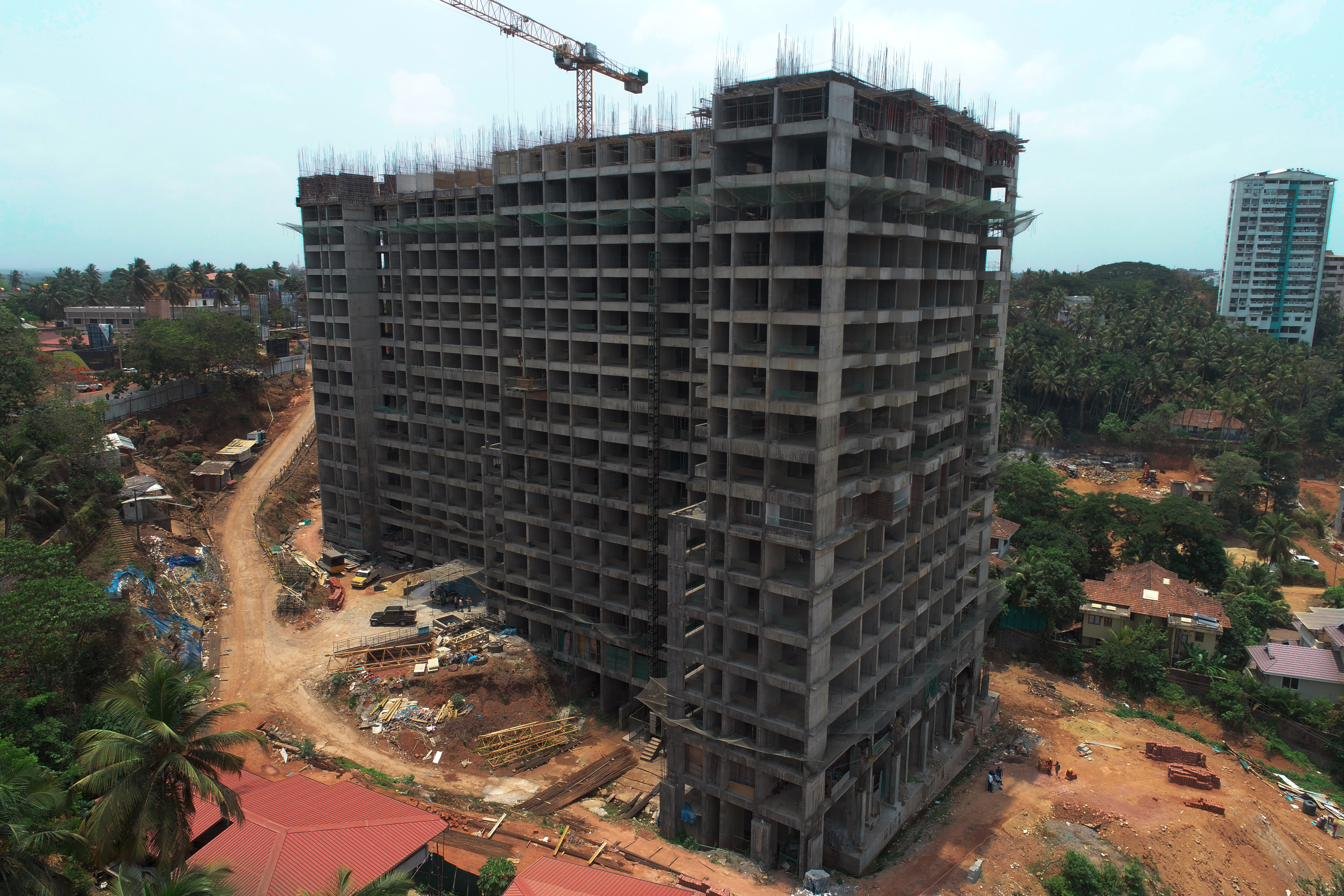 Drone photograph of high-rise building under construction — real estate drone photography by AerialPhotoIndia