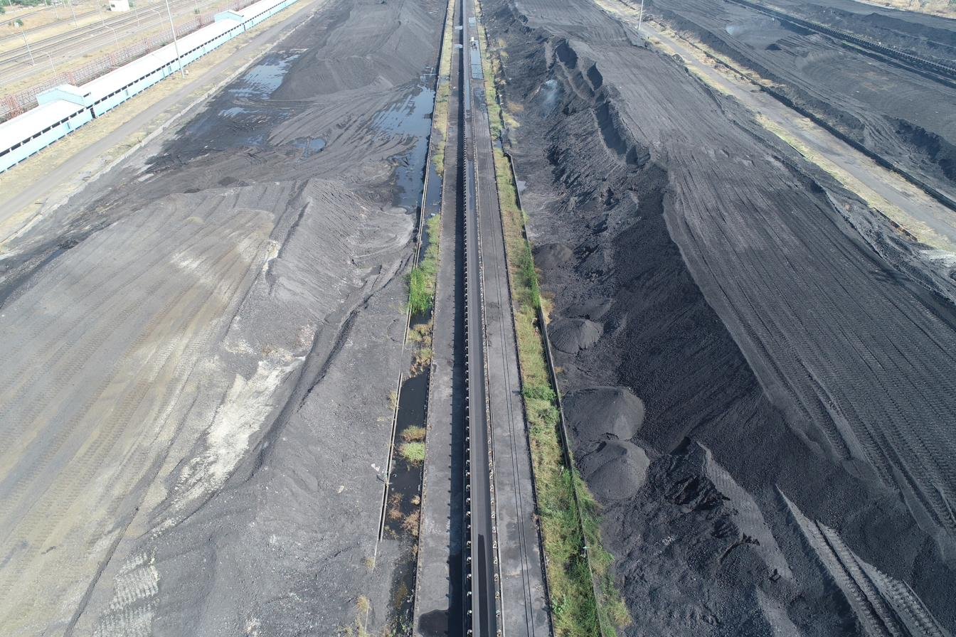 Drone-based volumetric stockpile calculation at industrial coal yard — AerialPhotoIndia survey services