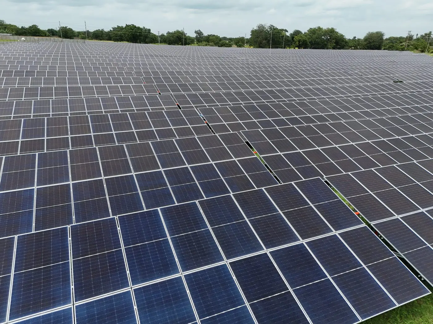 Close-up aerial view of solar PV panels during drone inspection survey — AerialPhotoIndia Pune